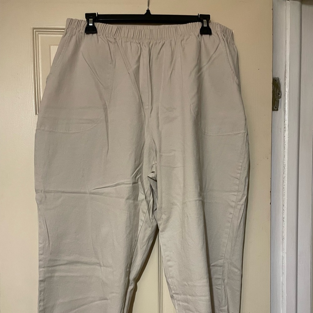 Quacker Factory beige pull ups. Pockets and rhinestones on slit at hem.